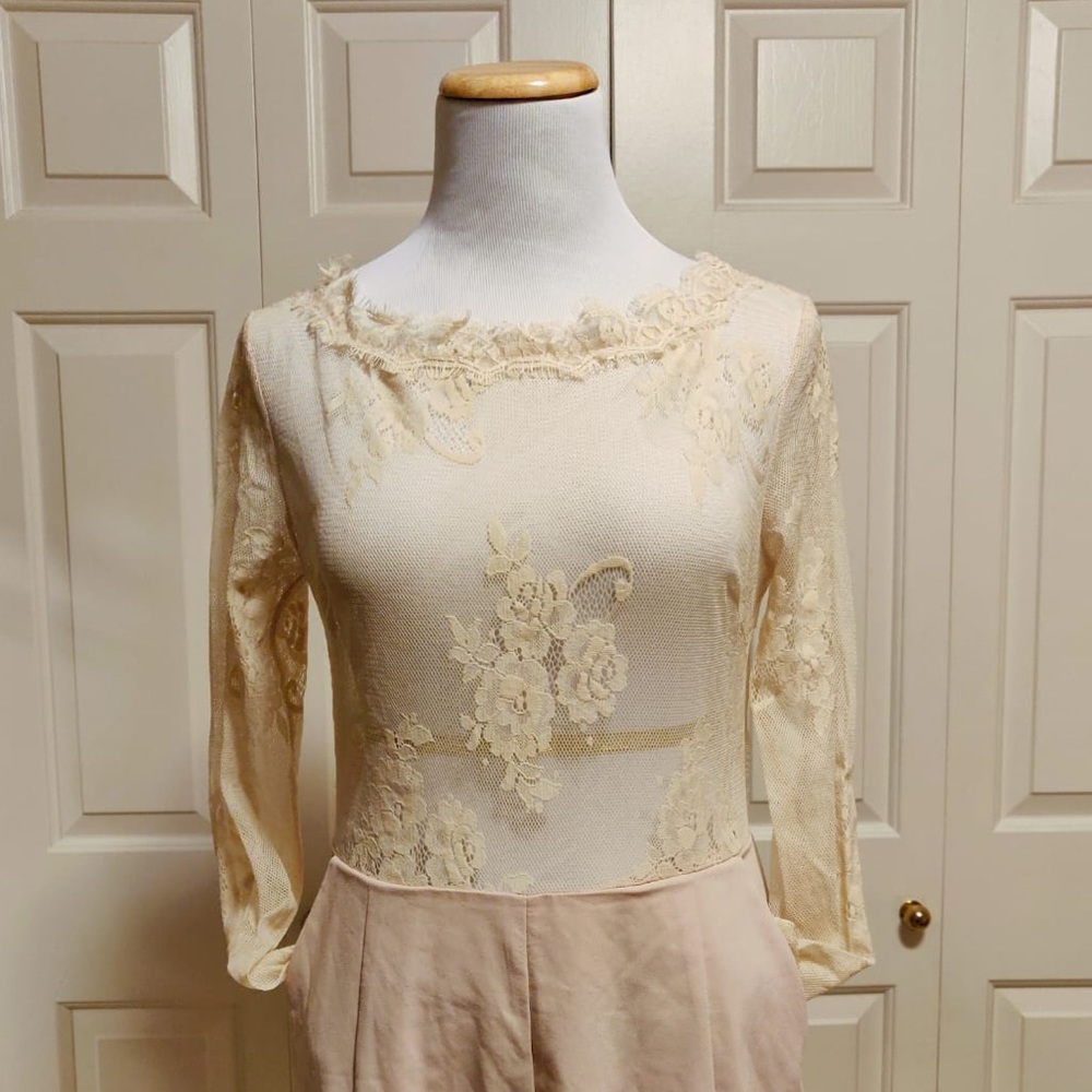 Beautiful lace jumpsuit with open back